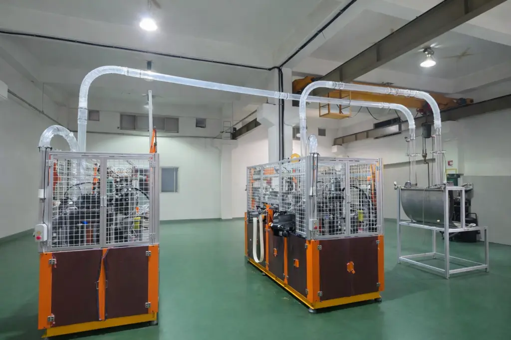 Two sets of MH-K01 high speed paper cup machine installed in factory production line – Woosung Machinery Co Korea