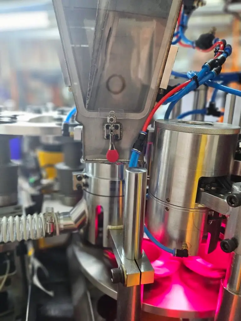 Automatic defective paper cup rejection system integrated in high speed paper cup making machine